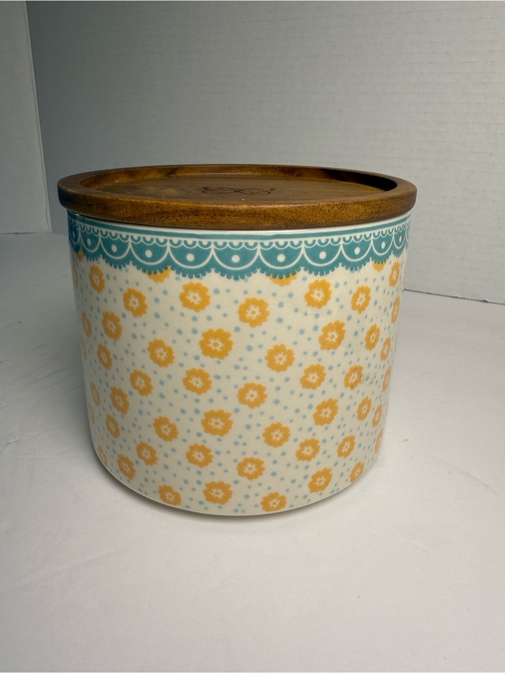 The Pioneer Woman Yellow Floral Ceramic Canister with Teal Trim